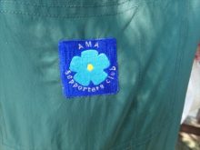 お揃いのエプロンのロゴマーク